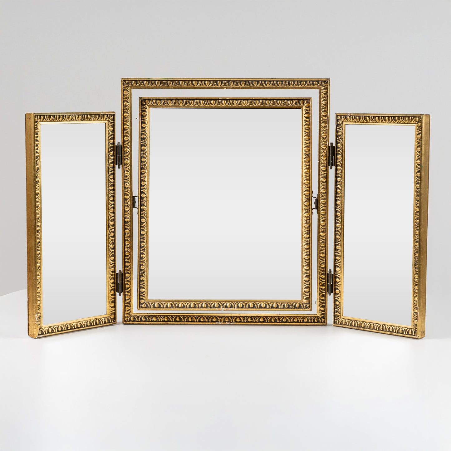 Kolmiosainen taitettava peili, kullattu